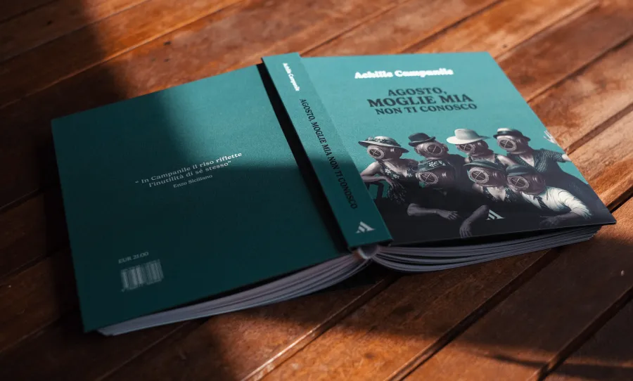 Front and back cover laid open on a wooden table