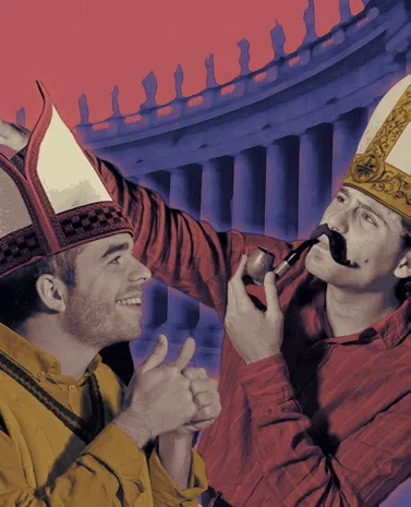 Two men in bishop's mitres in front of a colonnade