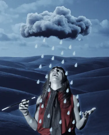 A woman under a rain cloud in a blue field