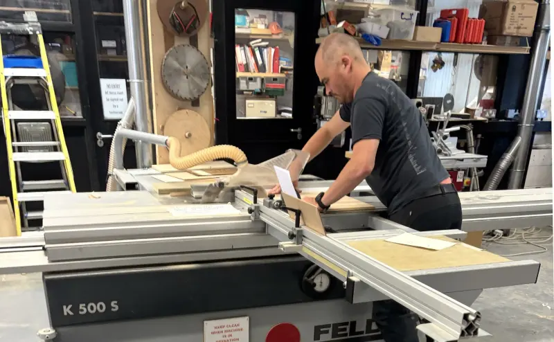 Cutting the pine on a table saw in the NCAD workshop
