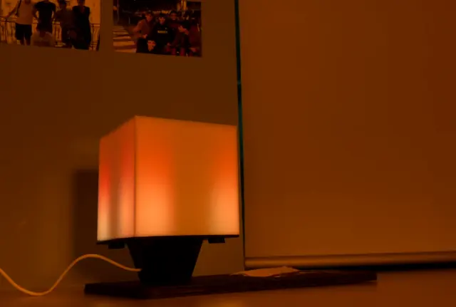 NOX settled back into its quiet warm glow, the room calm again