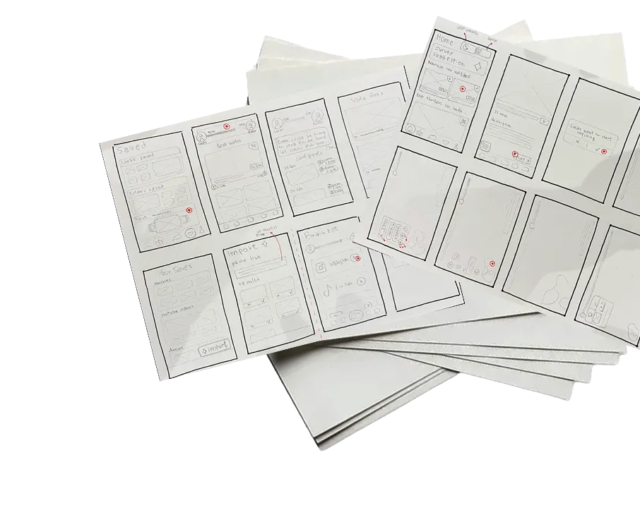 A loose stack of paper wireframe sheets