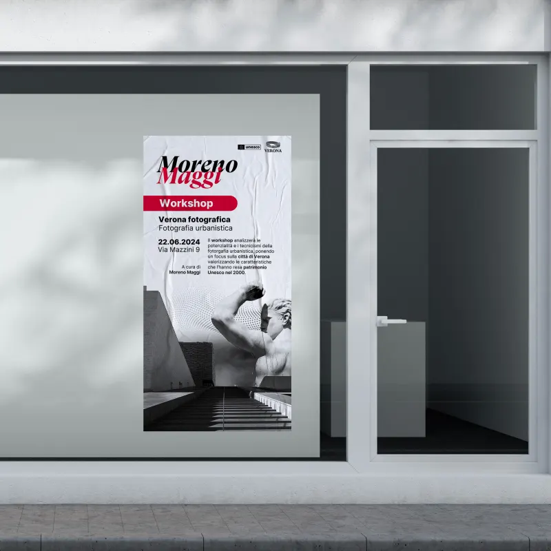 A workshop poster in a shop window